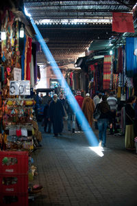 People at market stall