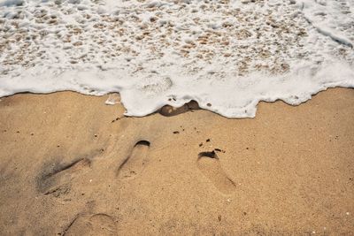 High angle view of sand on beach