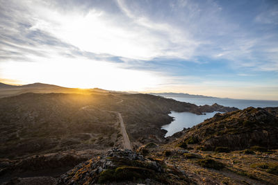 Scenic view of mountains against sky during sunset