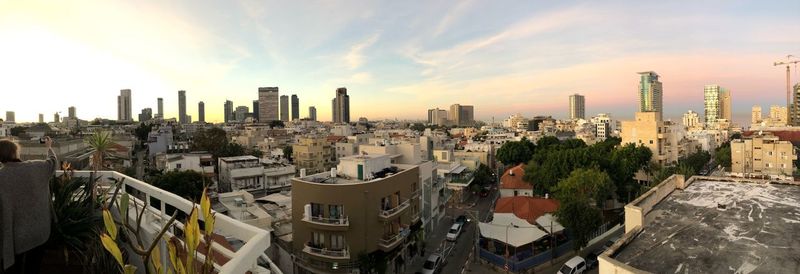 High angle view of buildings in city against sky