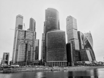 Low angle view of skyscrapers against clear sky