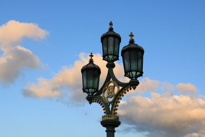 Low angle view of street light against sky