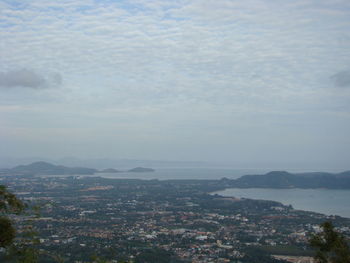 High angle view of buildings in city against sky
