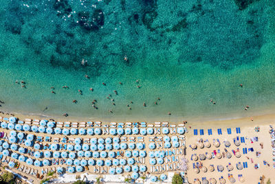 High angle view of people in sea during summer