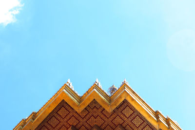 Low angle view of building against blue sky