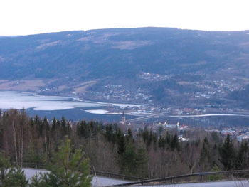 High angle view of landscape and mountains against sky