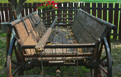 High angle view of empty bench in park