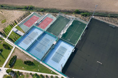 Empty stadiums for football, basketball and tennis sports, aerial, drone photograph