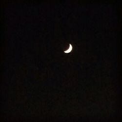 Low angle view of moon in sky