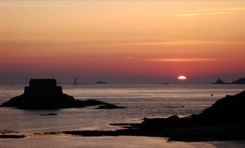 Scenic view of sea against sky during sunset