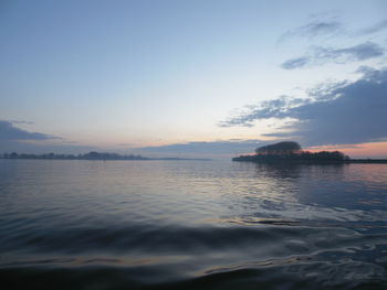 Scenic view of sea at sunset