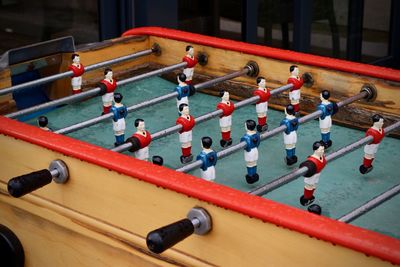 High angle view of soccer playing on table