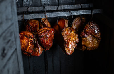 High angle view of meat on barbecue grill