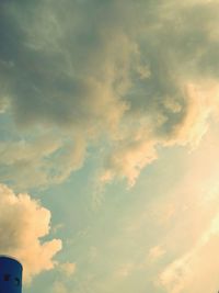 Low angle view of dramatic sky during sunset