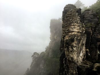 Scenic view of tree mountains against sky