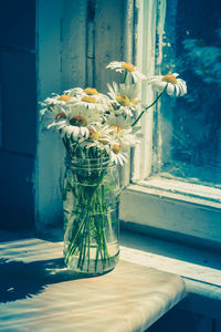 Close-up of flower vase on table