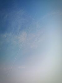 Low angle view of vapor trail in sky