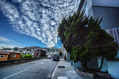 View of road against cloudy sky