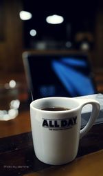 Close-up of coffee cup on table