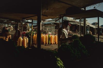 People at market stall