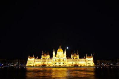 Illuminated city lit up at night