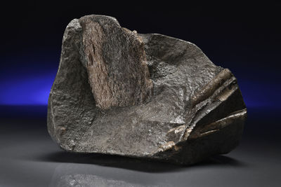 Close-up of rock against black background