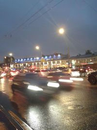 Traffic on city street at night