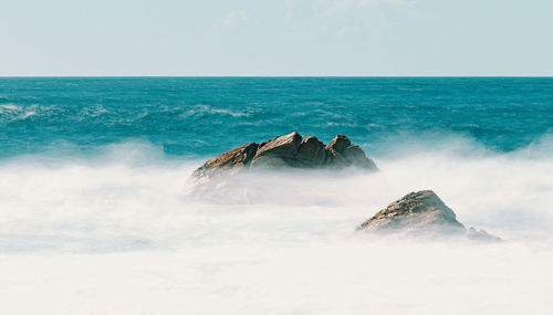 Scenic view of sea against clear sky