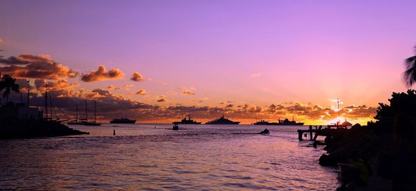 Scenic view of sea against sky at sunset