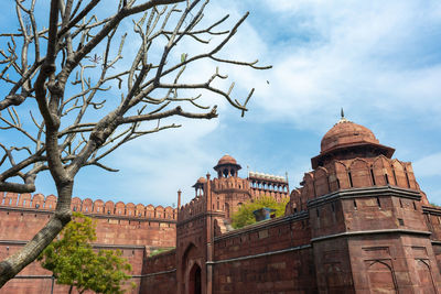 Low angle view of historic building against sky