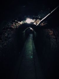 Narrow walkway at night