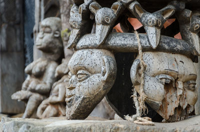 African wood carvings at traditional fon's palace in bafut, cameroon, africa