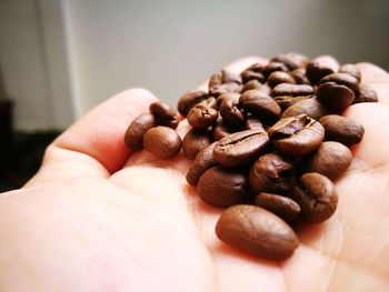 Close-up of hand holding coffee