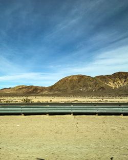 Scenic view of desert against sky