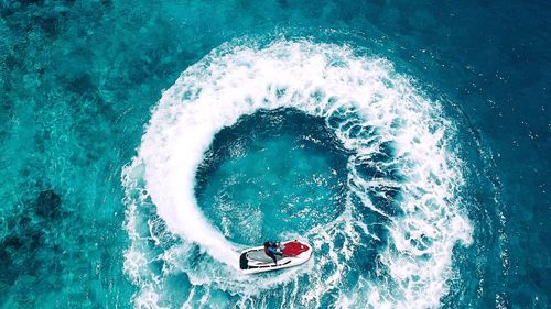 High angle view of person surfing in sea