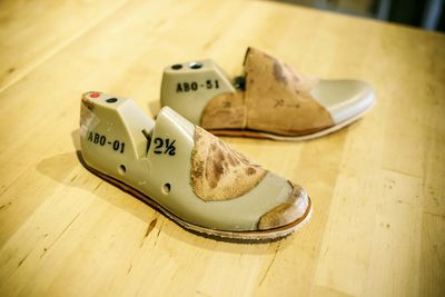 High angle view of dummy shoes on table