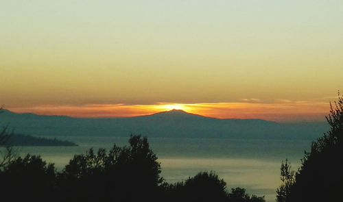 Scenic view of mountains at sunset