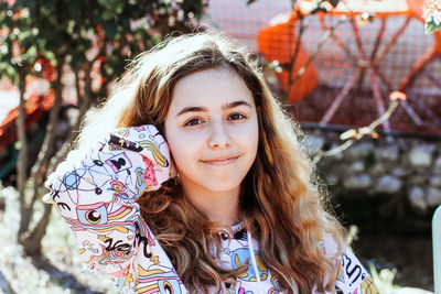 Portrait of young woman looking away