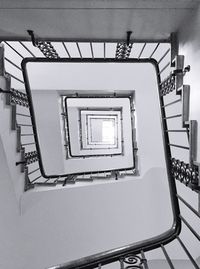 Low angle view of spiral staircase at home