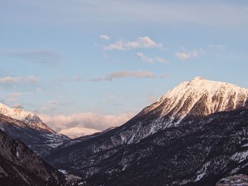 Scenic view of mountains against sky during winter