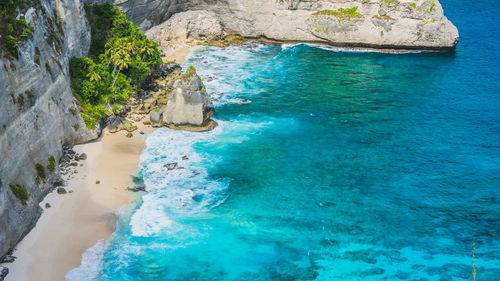 High angle view of sea against blue sky