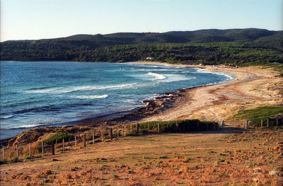 Scenic view of sea against clear blue sky