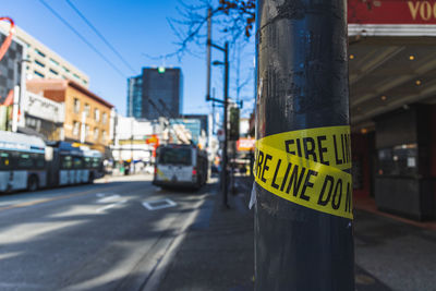 Road sign on street in city