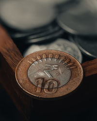 High angle view of coins on table