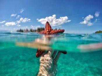 View of sea against blue sky