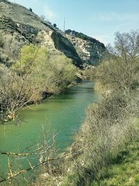 Scenic view of river against sky