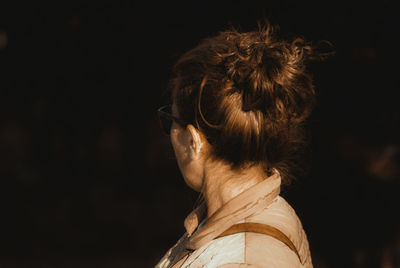 Side view of woman looking away