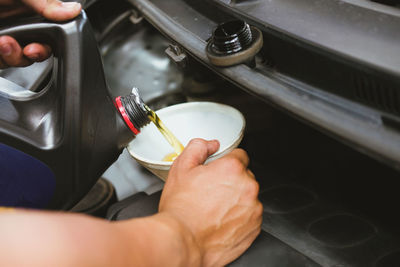 High angle view of man working in kitchen