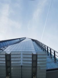 Building against cloudy sky