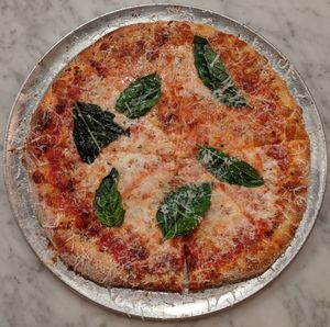 High angle view of pizza served on table